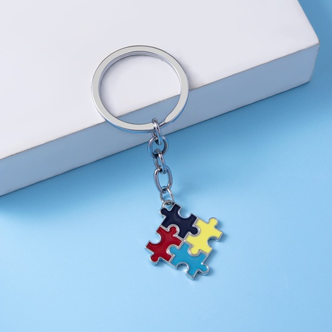 Cartoon Cute Dripping Oil Square Autistic Four-Color Puzzle Keychain's discount tags