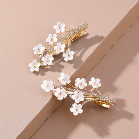 Nuevos accesorios para el cabello de flores de perlas de ramas de diamantes de imitación de moda's discount tags