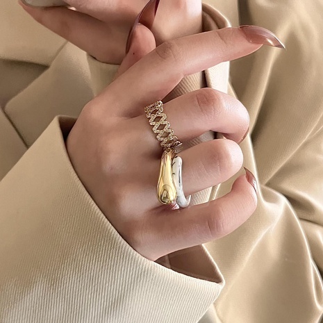 Moda nuevo Metal costura espiral rombo hueco joyas apertura anillo de diamantes de imitación's discount tags