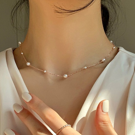 Collar de perlas de imitación de moda con incrustaciones barrocas de perlas con cuentas de cadena de clavícula's discount tags