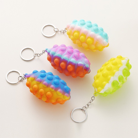 Color descompresión Rugby burbuja bola llavero descompresión juguete educativo 3D alivio de estrés bola agarre's discount tags