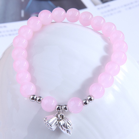 Fashionable Sweet Metal Lotus Pink Ball Pendant Bracelet's discount tags
