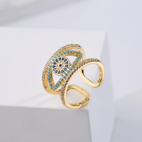 Fashion Copper Plated Real Gold Micro Inlaid Zircon Hollow Devil Eye Open Ring's discount tags