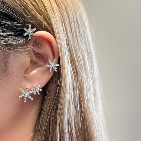 Fashion Snowflake Four Six-Pointed Star Metal Earrings Clip's discount tags