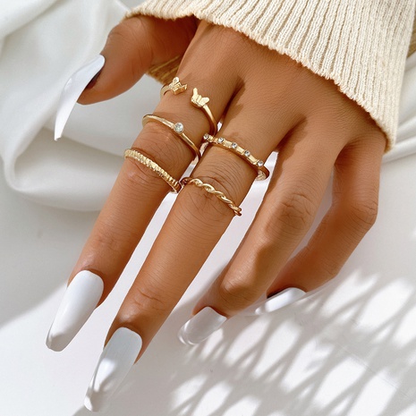 Conjunto de 5 piezas de anillo de nudillos de Metal de mariposa con incrustaciones de diamantes para mujeres creativas simples's discount tags