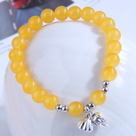 Fashion Sweet Metal Lotus Yellow Ball Pendant Bracelet's discount tags