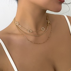Conjunto de collar de cara sonriente creativo de cadena de doble cruz de adorno dulce hueco de moda
