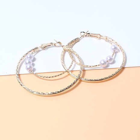 Fashion Double Ring Pearl Female Simple Geometric Hollow Earrings 's discount tags