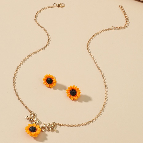 Fashion Cute Sunflower Leaf Pendant Resin Necklace Ear Stud Set's discount tags