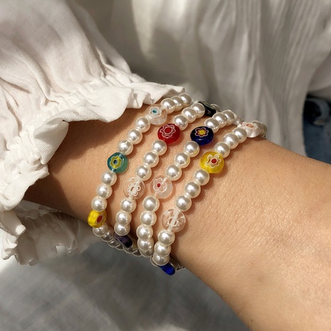 Fashion flower cute female pearl elastic bracelet's discount tags