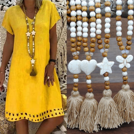 Collier de perles en bois fait à la main avec pompon bohème's discount tags