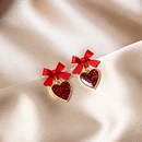 Boucles doreilles  nud long pompon en diamant dgoulinant dhuile de coeur rouge simplepicture7