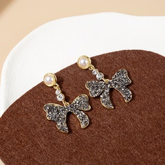 Fashion Pearl Inlaid Diamond Bow Tassel Earrings
