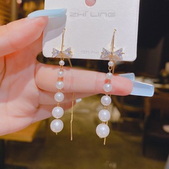 Fashion long pearl bow alloy earrings female