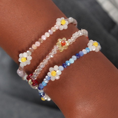 Paquete de tres pulseras con cuentas boho para mujer con flores trenzadas de cristal a la moda's discount tags