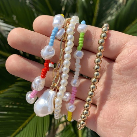 Ethnic irregular imitation pearl woven multi-circle bracelet's discount tags