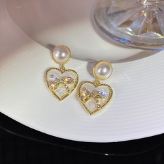 Silver needle pearl earrings women's 2022 new trendy summer temperament earrings niche earrings high-end light luxury earrings
