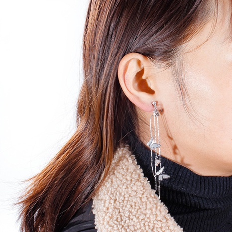 Silberne Nadelohrringe Feen-Retro-Bogen-Quastenohrringe weibliches koreanisches Temperament lange einfache Ohrringe's discount tags