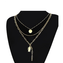 einfache dreischichtige Halskette mit runder Platte aus Titanstahl und Gold weiblich