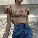Camiseta de manga corta con cremallera y espalda descubierta informal con costuras a la moda para mujerpicture15