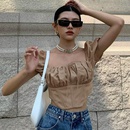 Camiseta de manga corta con cremallera y espalda descubierta informal con costuras a la moda para mujerpicture16