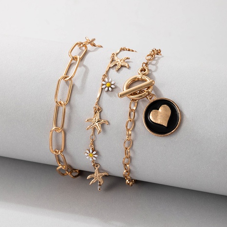 New Simple Geometric Chain Bracelet Flower heart Bracelet Three-Piece set's discount tags