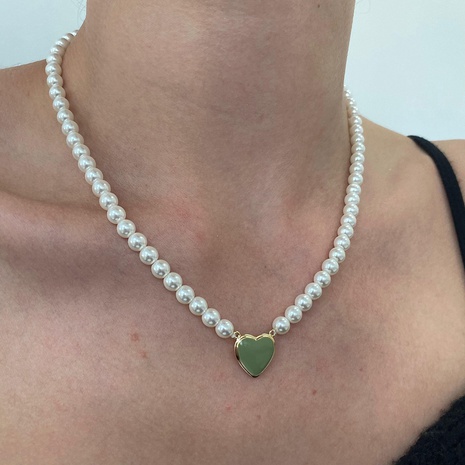 Moda Simple clavícula cadena mujer barroco perla con cuentas corazón colgante collar al por mayor's discount tags