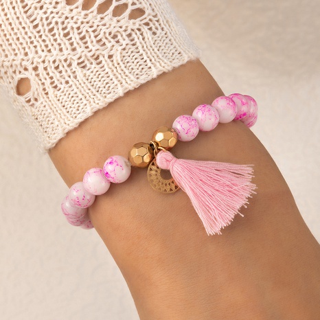 Ethnic Style Pink Beaded Tassel Geometric Pendant Single Layer Bracelet's discount tags