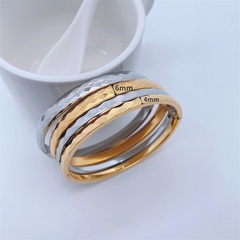 Simple elegante 18K chapado en oro titanio acero pulsera ornamento femenino