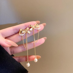 Fashion Simple Pearls Bow Long Tassel Alloy Earrings