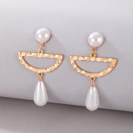 2022 New style Inlaid Pearl Hollow Geometric Alloy pendant Earrings's discount tags