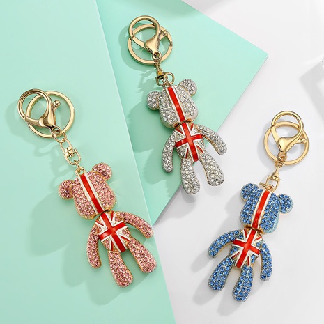 Llavero colgante de bolso de mano con forma de oso de dibujos animados de colores incrustados de diamantes de imitación de moda's discount tags