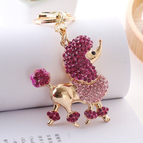 12 Zodiaco incrustaciones de diamantes de imitación lindo creativo Metal llaveros colgante decoración coche cachorro en forma de colgante's discount tags