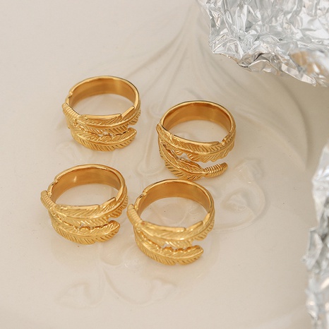 Neue art-Roll-Förmigen Feder Titan Stahl Vergoldet 18K Gold Ring's discount tags