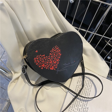2022 New Fashion Simple Heart Female Retro Spring and Summer One Shoulder Crossbody Bag's discount tags