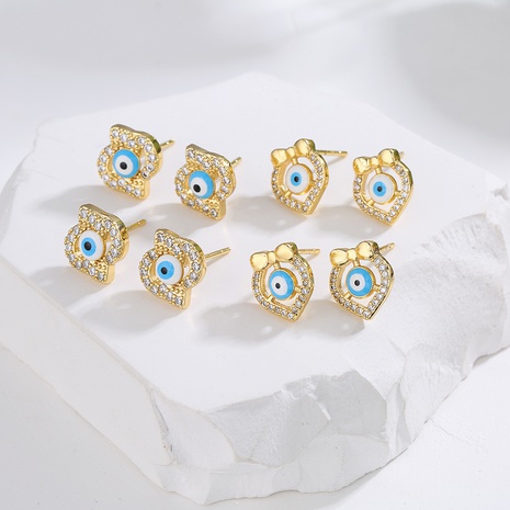 Fashion Plating 18K Gold Micro Inlaid Zircon Dripping Oil Geometric Eye Ear Stud Copper Earrings's discount tags