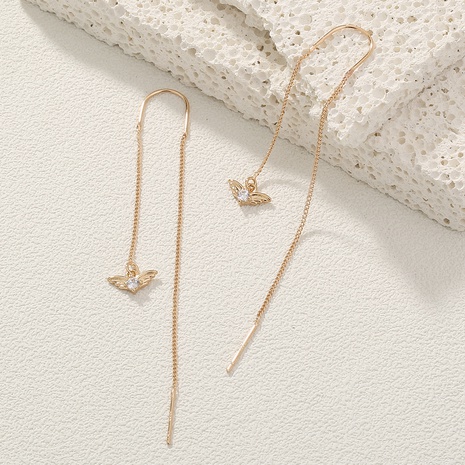 Pendientes de cobre para mujer con línea de oreja colgante alas largas simétricas de moda's discount tags