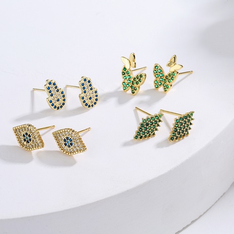new style Copper Gold Plated Micro Inlaid Zircon Eyes Butterfly Palm Stud Earrings's discount tags