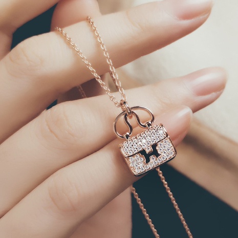 Fashion H Letter Bag Full Diamond Pendant Female Titanium Steel Necklace's discount tags