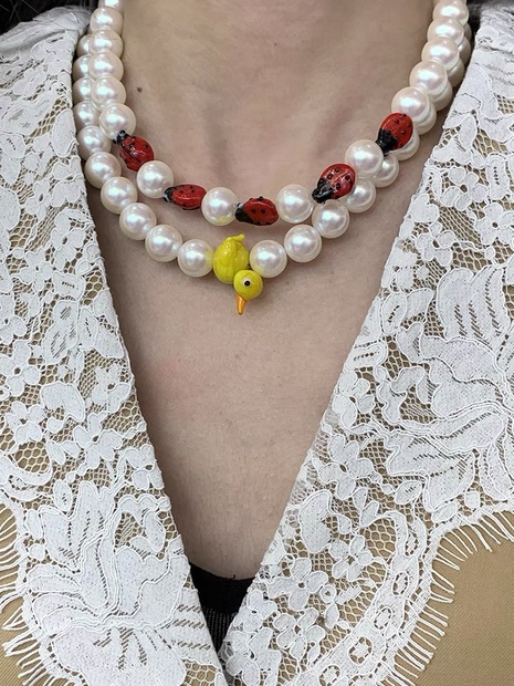 Personality Small Yellow Duck Ladybug Contrast Color Beaded Pearl Necklace's discount tags