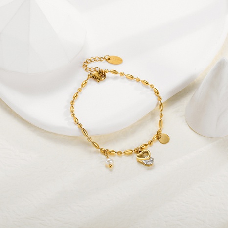 Fashion Pearl Three-Dimensional Heart Pendant 14K Gold Plated Titanium Steel Bracelet Wholesale's discount tags