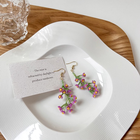 Eine Reihe von hand gefertigten Perlen ohrringen aus Pflaumen blüte's discount tags