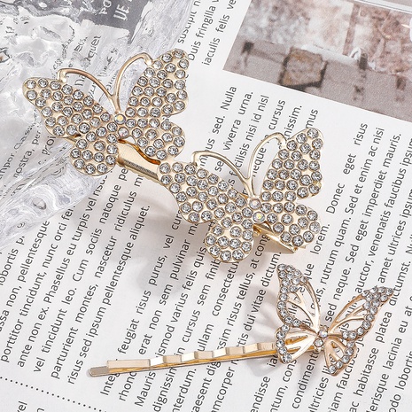 New Inlay Rhinestone Hollow Butterfly Shaped Barrettes Hair Clip's discount tags