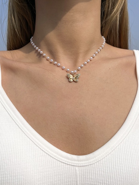 Collar elegante de la cadena de la clavícula de la mariposa con incrustaciones de diamantes de imitación de la perla de moda's discount tags