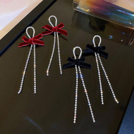 Fashion Full Diamond Solid Color Bow Long Tassel Rhinestone Earrings's discount tags