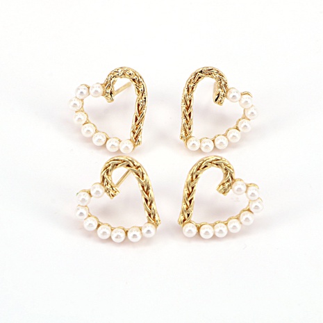 Pendientes de cobre con incrustaciones de perlas doradas en forma de corazón's discount tags