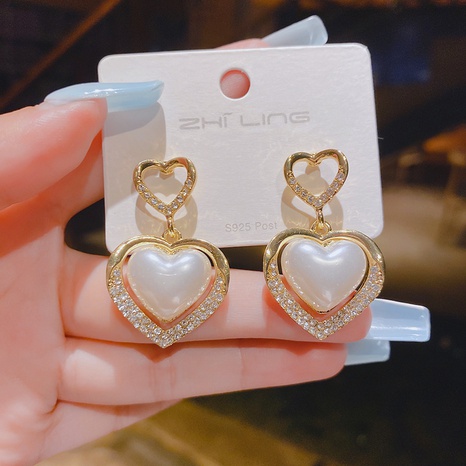 Pendientes colgantes de perlas con forma de corazón y borla de aleación de nuevo estilo's discount tags