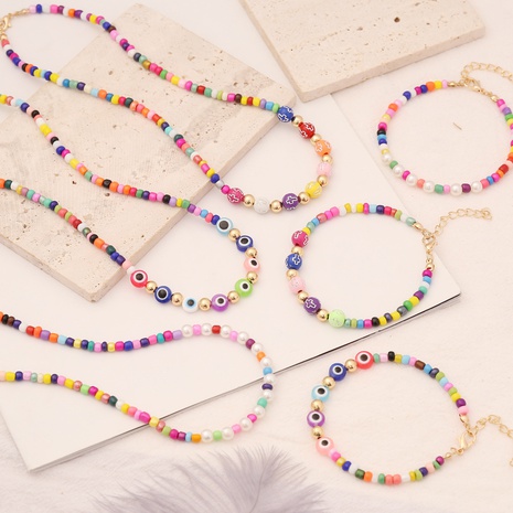 Collar y pulsera de perlas coloridas bohemias's discount tags