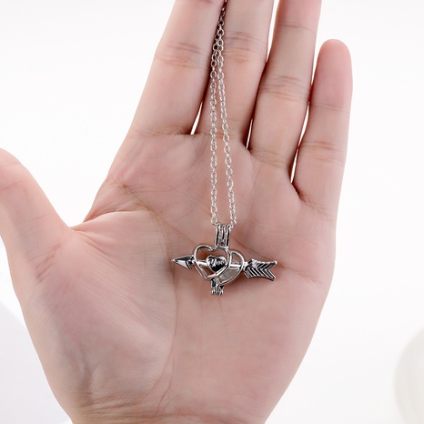Fashion Simple Hollow Metal Pearl Arrow Heart Alloy Necklace's discount tags