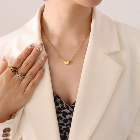 Collar de oro de 18K con colgante en forma de corazón de acero titanio de moda's discount tags